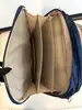 sacoche porte-documents/sac de voyage lancel bleu marine en toile et cuir avec cadenas et clés